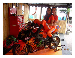 Girls at a photo shot on KSL air conditioing and refigeration sponsored BSB motorcycle, 01634 290999 for details.